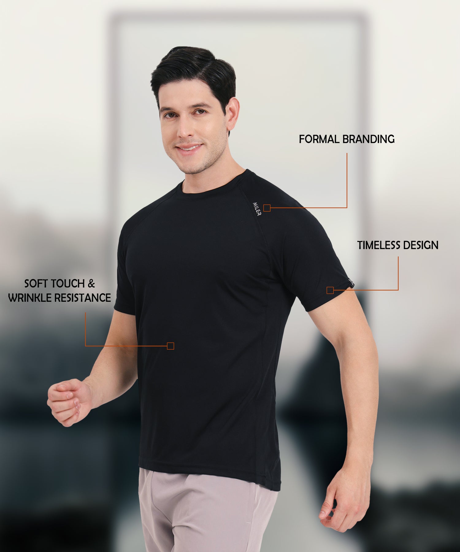 Men’s black raglan t-shirt with soft touch wrinkle resistance and formal Miler branding