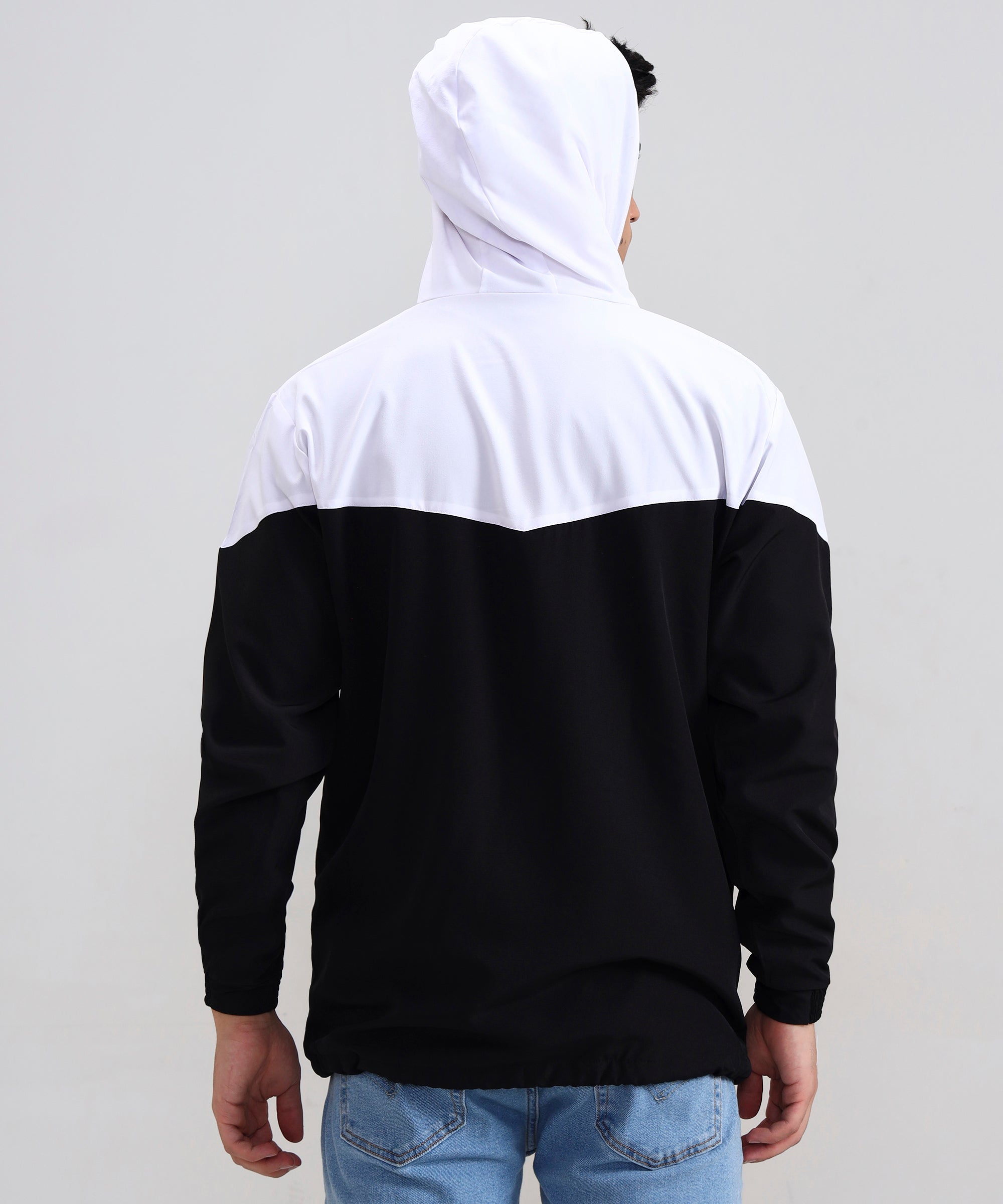 Casual men’s black and white hoodie, premium cotton blend, shown from behind